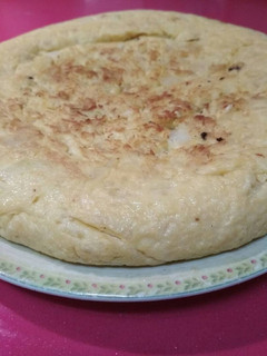 Una foto de Tortilla de patata y calabacín