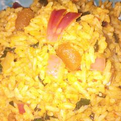A picture of Native jollof rice with pomo.