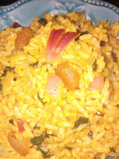 A picture of Native jollof rice with pomo.