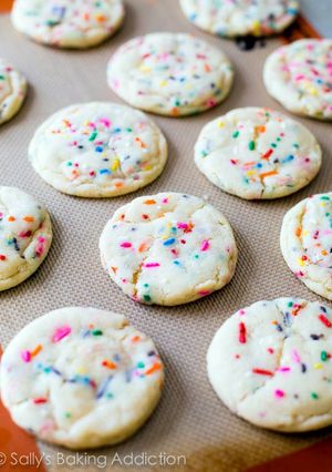 A picture of sugar cookies with sprinkles.