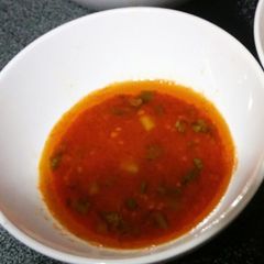 Hot Sriracha Oil Dipping Sauce for hot pot A picture of Hot Sriracha Oil Dipping Sauce for hot pot.