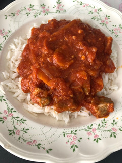 Una foto de Carne con tomate