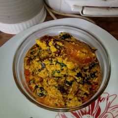 A picture of Egusi and Groundnut soup.