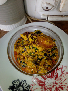 A picture of Egusi and Groundnut soup.