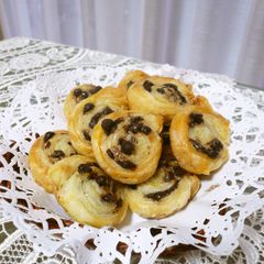 A picture of Bite-Sized Chocolate Chip Pies with Frozen Puff Pastry.