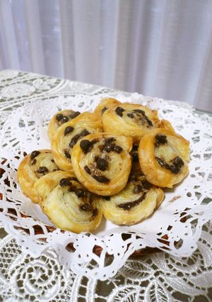 A picture of Bite-Sized Chocolate Chip Pies with Frozen Puff Pastry.