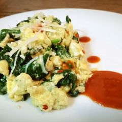 A picture of Spinach and eggs.
