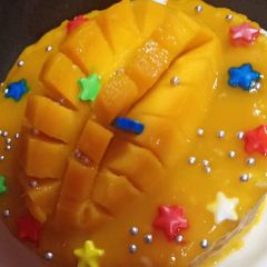 Milkmaid Mango Cake A picture of Milkmaid Mango Cake.
