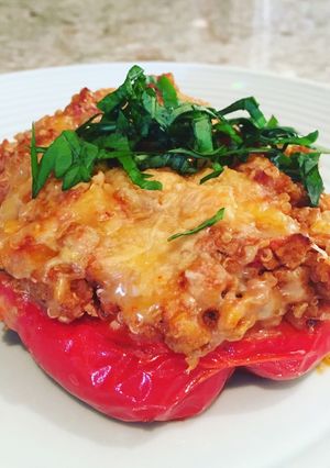A picture of Italian stuffed peppers with turkey and quinoa.