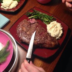 A picture of Oven Roasted Ribeye W/ Shallot Bleu Cheese Sauce.