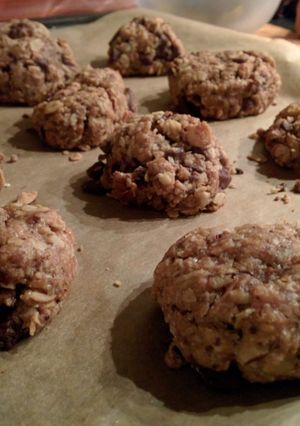A picture of Oatmeal cookies with nuts & chocolate.