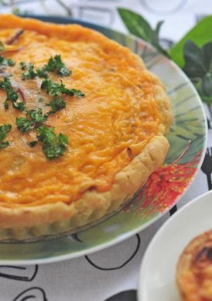 A picture of Dried Tomatoes and Cheddar Cheese Quiche.