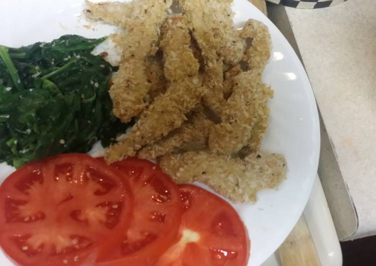 Turkey Cutlets with sautéed spinach and tomato slices Turkey Cutlets with sautéed spinach and tomato slices