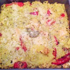 A picture of Spaghetti Squash with pesto and chicken.