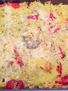 A picture of Spaghetti Squash with pesto and chicken.