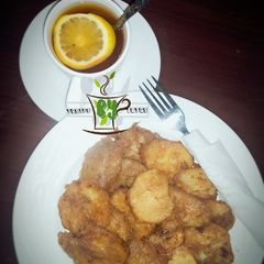 A picture of Fried sweet potato with egg.