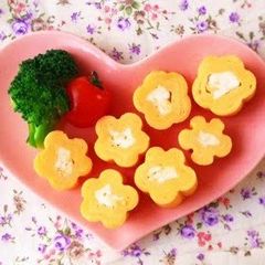 A picture of Flower Shaped Tamagoyaki Using Bamboo Skewers - For Bento Decorations.
