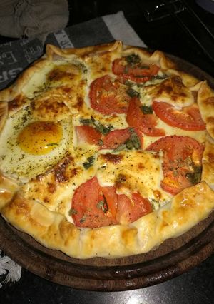 Una foto de Tarta jamón y queso c/ tomates y huevos!
