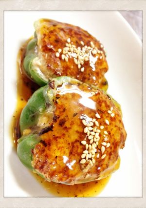 A picture of Meat and Firm Tofu Stuffed Peppers.