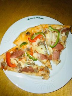 Hình của món Pizza nướng lò hoặc chảo.