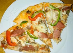 Hình của món Pizza nướng lò hoặc chảo.