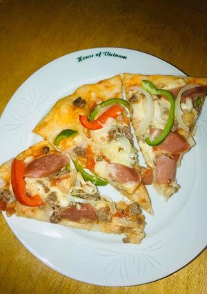 Hình của món Pizza nướng lò hoặc chảo.