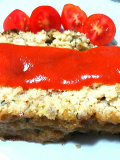 Una foto de Pastel de Mijo con salsa de tomate🌱🍅