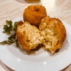 A picture of Deep fried mac and cheese balls.