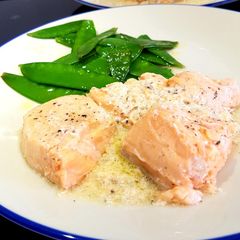 A picture of Sous vide salmon in a butter, ginger and lemon sauce.