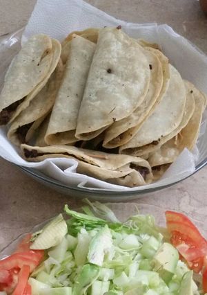 Una foto de Tacos dorados