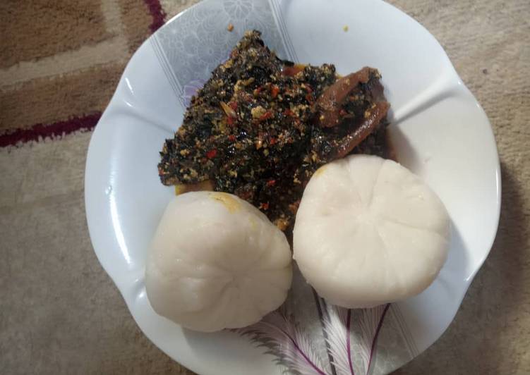 Tuwon Rice with ugwu and water leaf soup