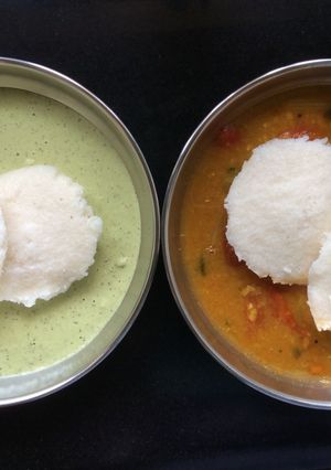 A picture of Idli With Chutney And Sambar.