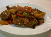 Una foto de chuleta de cerdo agridulce