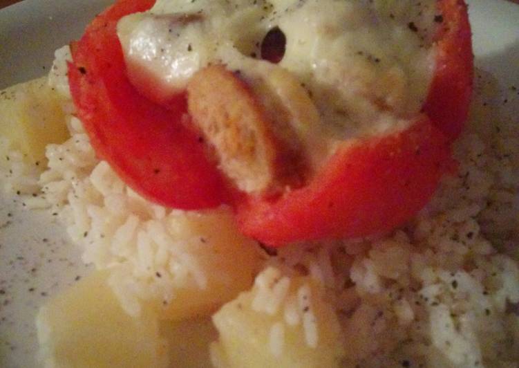 Get Breakfast of Stuffed tomato with sausage and boccocini on coconut and pineapple rice