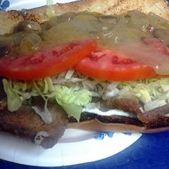 A picture of thin steak sandwich.