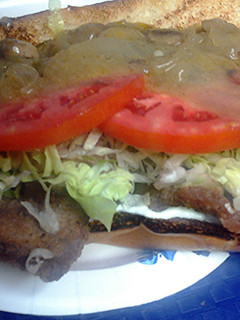 A picture of thin steak sandwich.