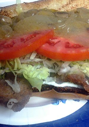 A picture of thin steak sandwich.
