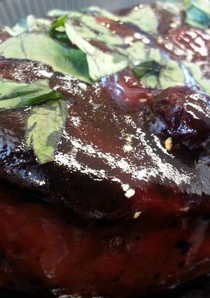 A picture of Pomegranate-Blueberry Glazed Pork Chop.