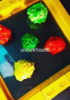 A picture of Steam, Colourful Rice balls.