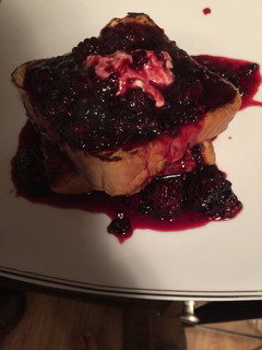 A picture of Vanilla French Toast With Sweet Cream Cheese And Fresh Blackberry Syrup.