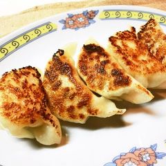 A picture of Chicken Gyoza with Shiso & Shio-Koji.