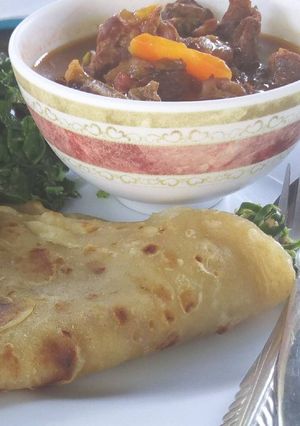 A picture of Chapati and beef stew.