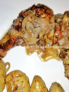 Una foto de Muslos de pollo con hierbas aromáticas