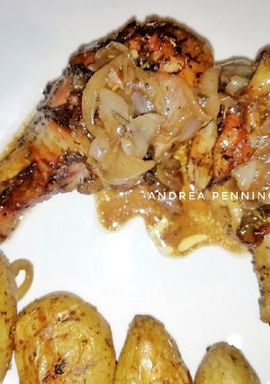 Una foto de Muslos de pollo con hierbas aromáticas