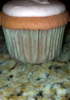 A picture of Moist Berry Berry Strawberry Cupcakes.