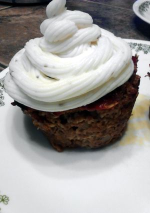 A picture of Meatloaf Cupcakes W/ Mashed Potato Frosting.