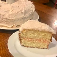 A picture of Raspberry-White Chocolate Cream Cake.