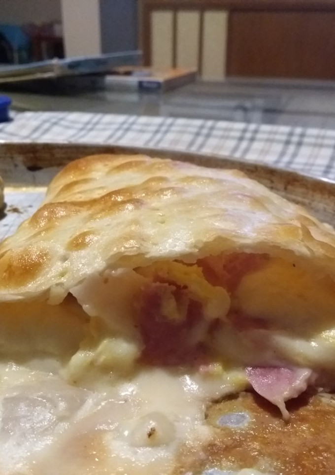Una foto de Tarta de jamón y queso agridulce