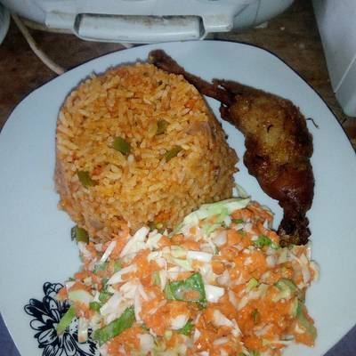 Jollof Rice and Chicken with Coleslaw - Travelandmunchies