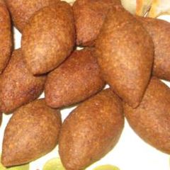 A picture of Kibbeh meatballs - kibbeh 'rass.